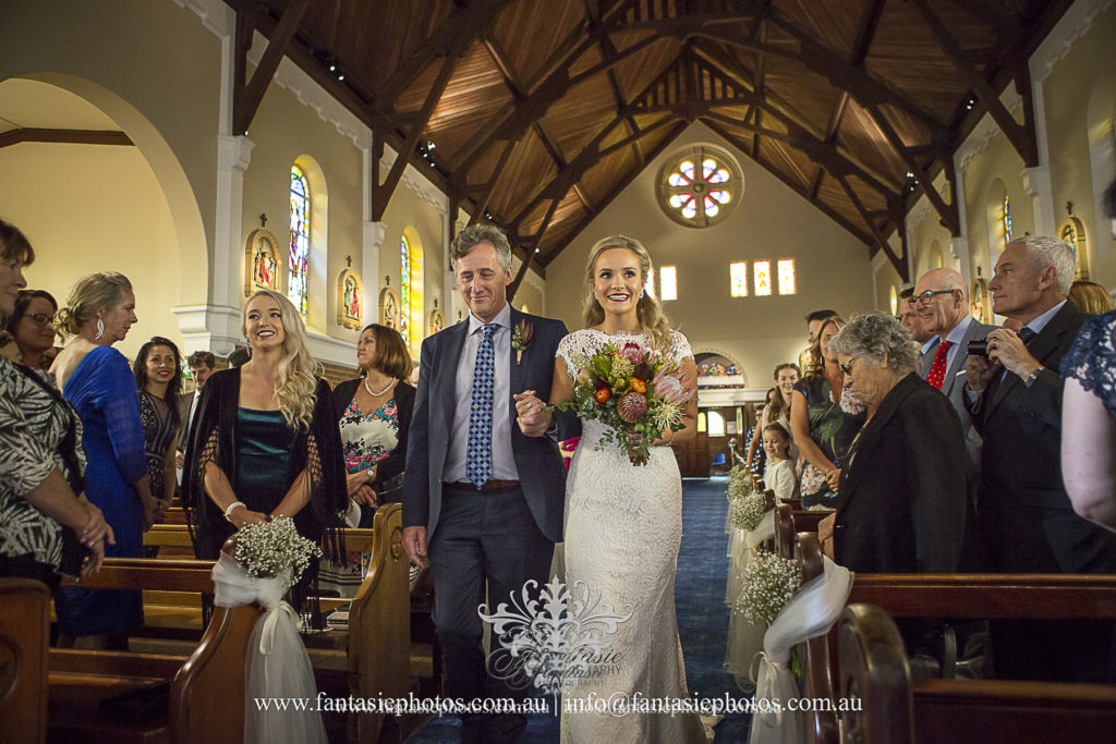Bride and her father march in to ceremony church blessed sacrement mosman